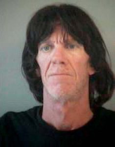 Witness: Man threatens him with paper cutter blade